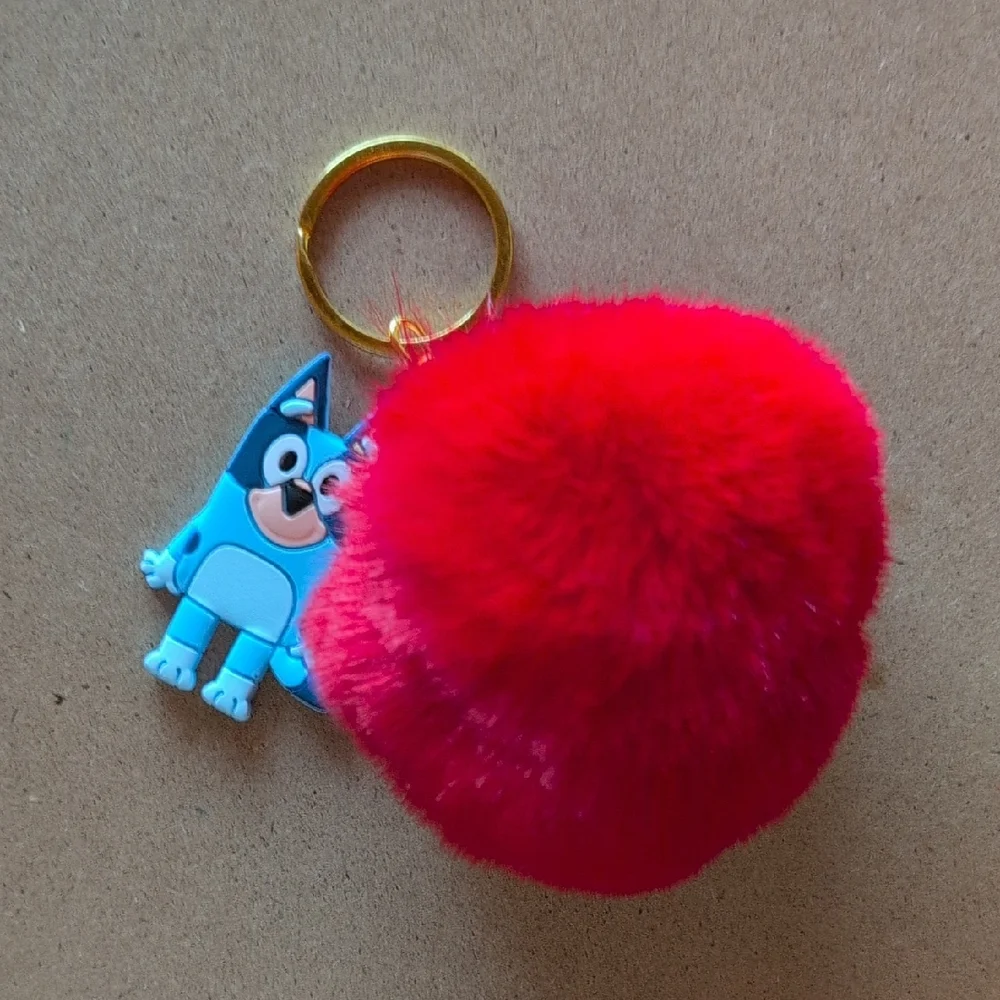 Red Pom Pom Keychain with Blue Character